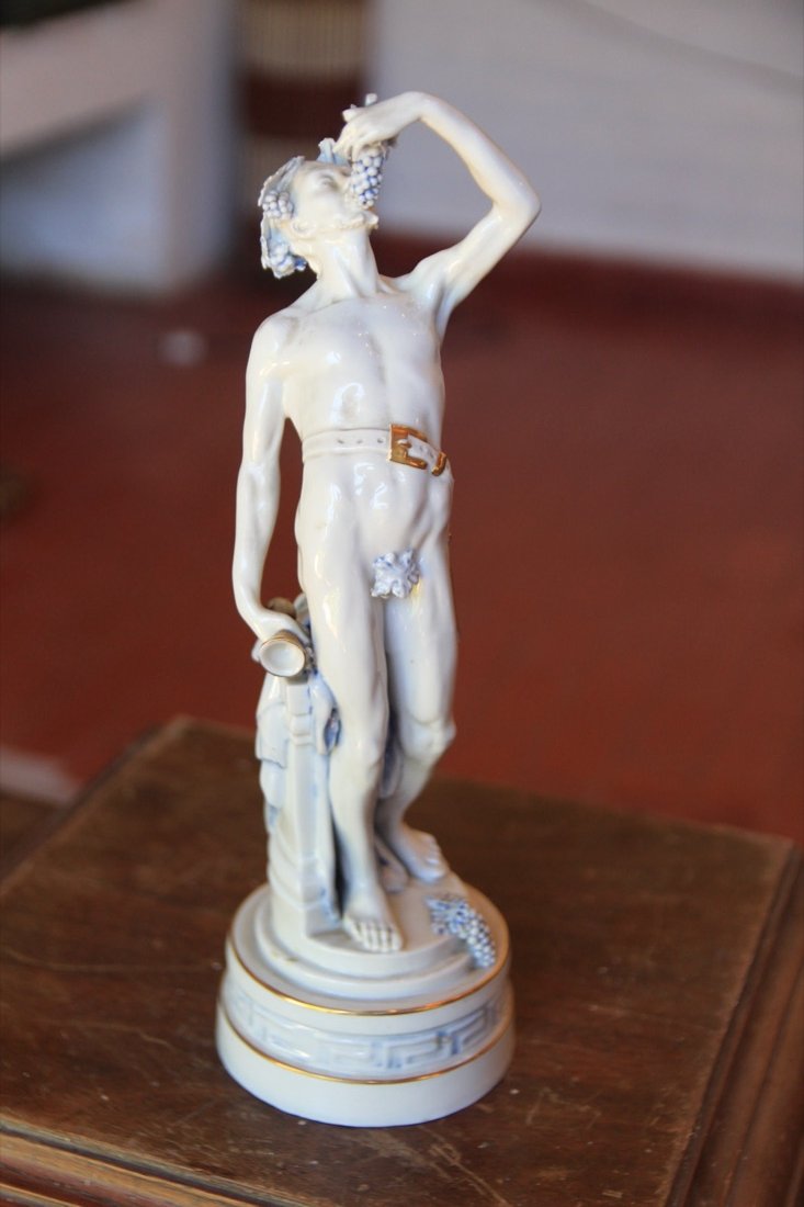 Figura de Baco, firmada y fechada 1912